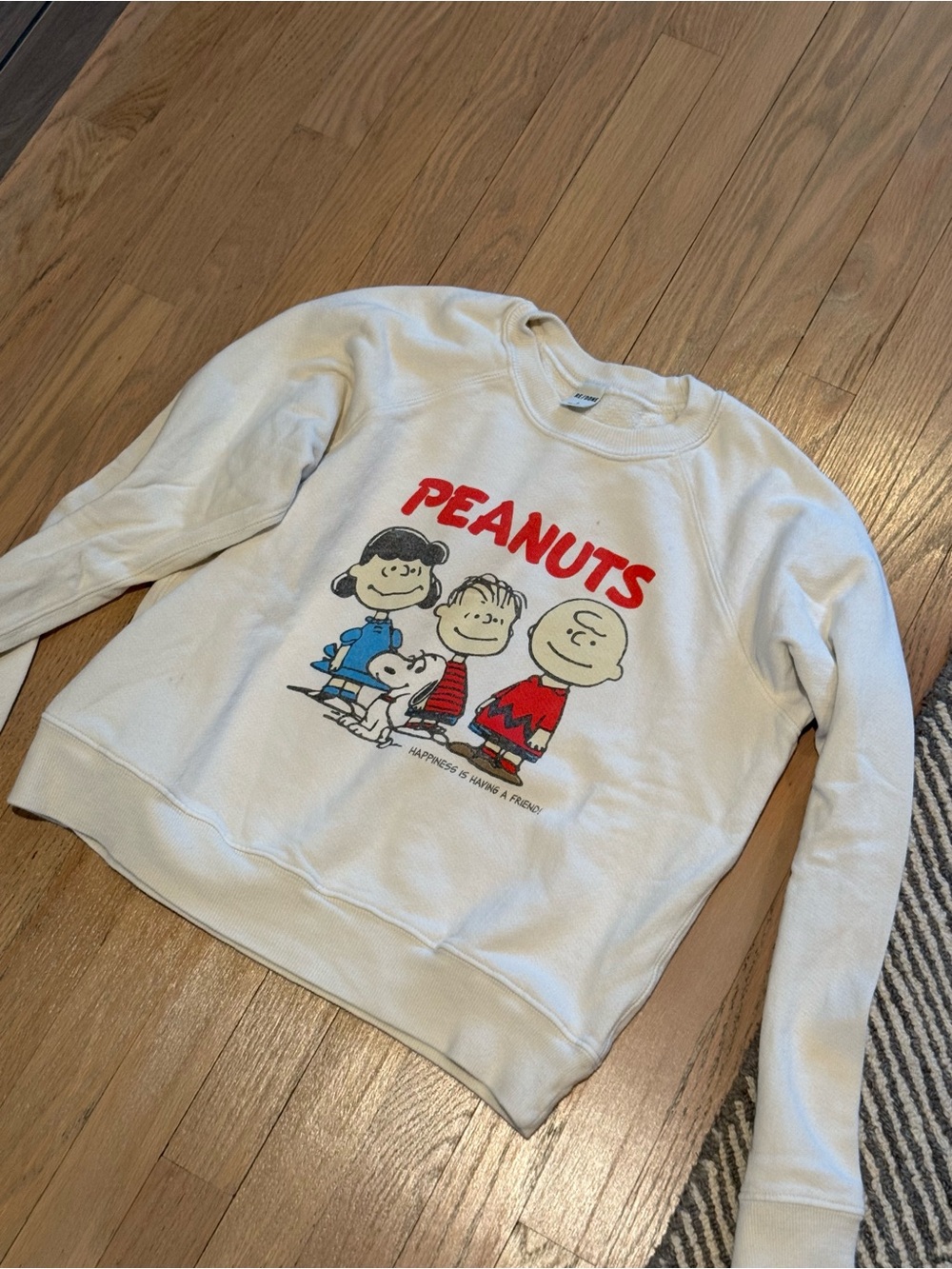 Re/Done Cream Peanuts Graphic Sweatshirt with Red & Blue Accents